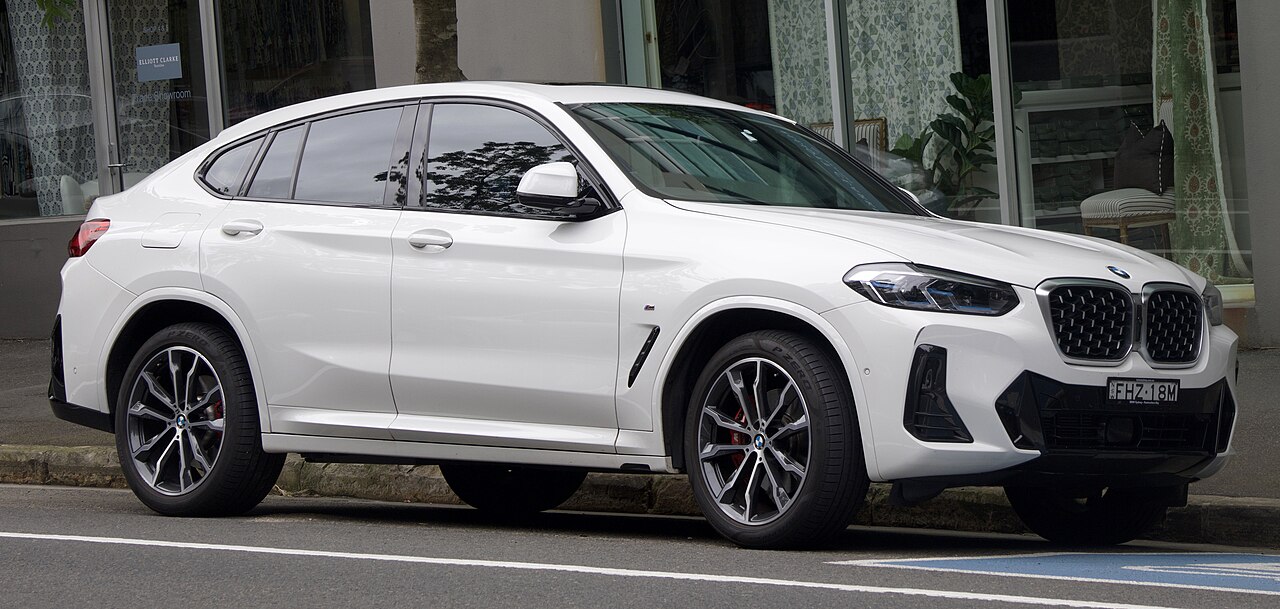 White BMW X4 xDrive30i M Sport G02 front and side