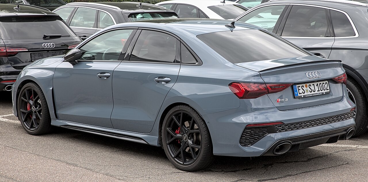Grey Audi RS 3 8Y Sedan rear and side