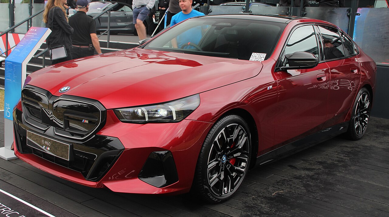 Red BMW i5 M60 G60 sedan display car