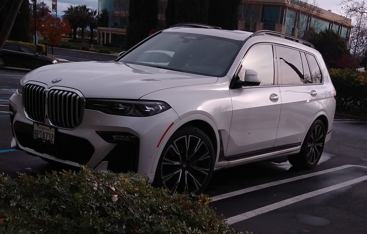 White 2019 BMW X7 xDrive50i G07 front and side