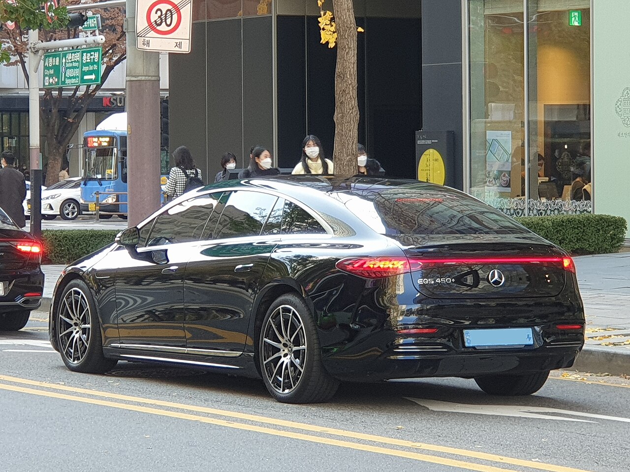 Black Mercedes-Benz EQS 450+ V297 rear and side