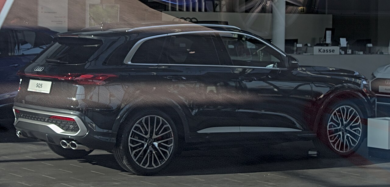 Brown Audi SQ5 GU SUV rear and side