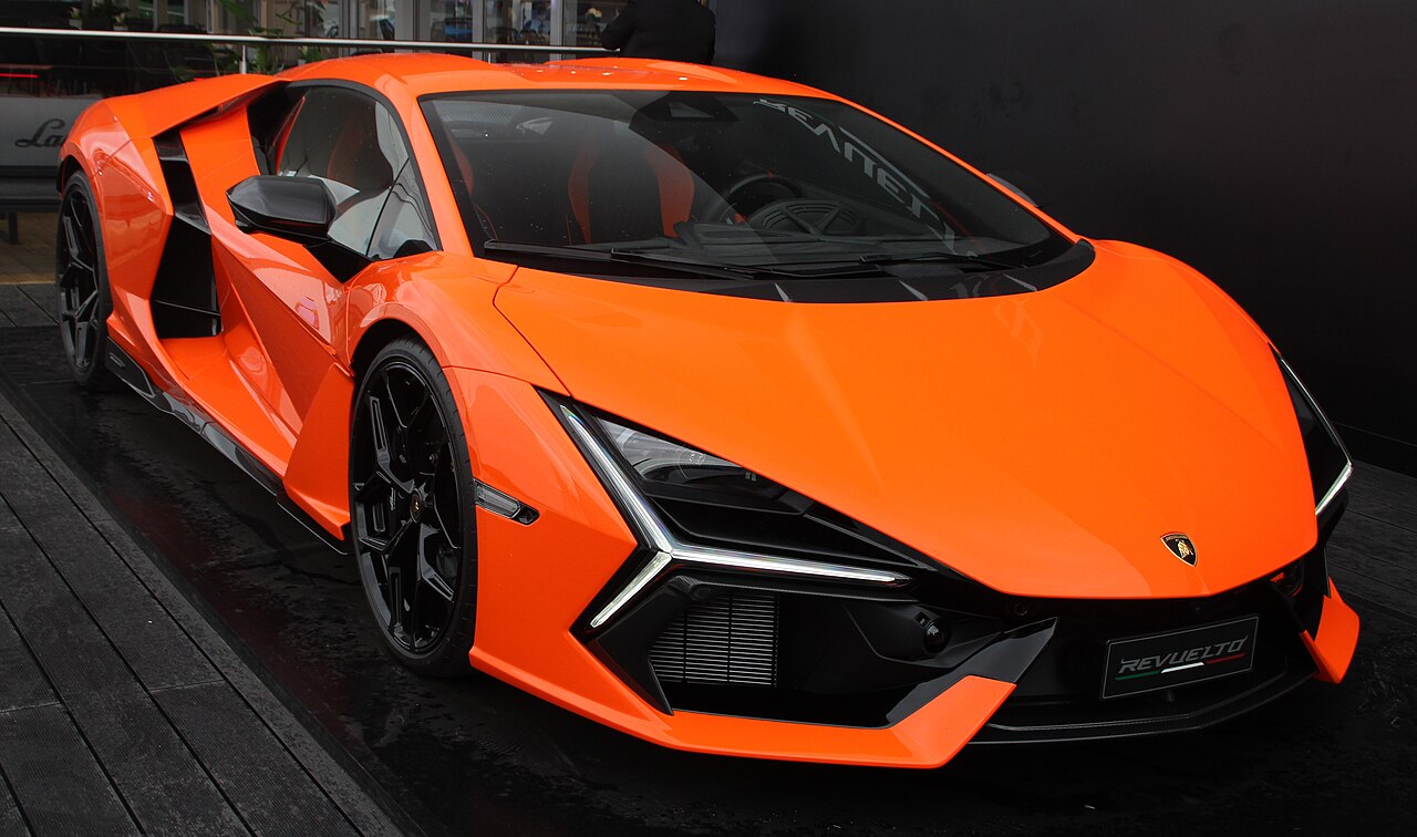 Orange Lamborghini Revuelto at a display