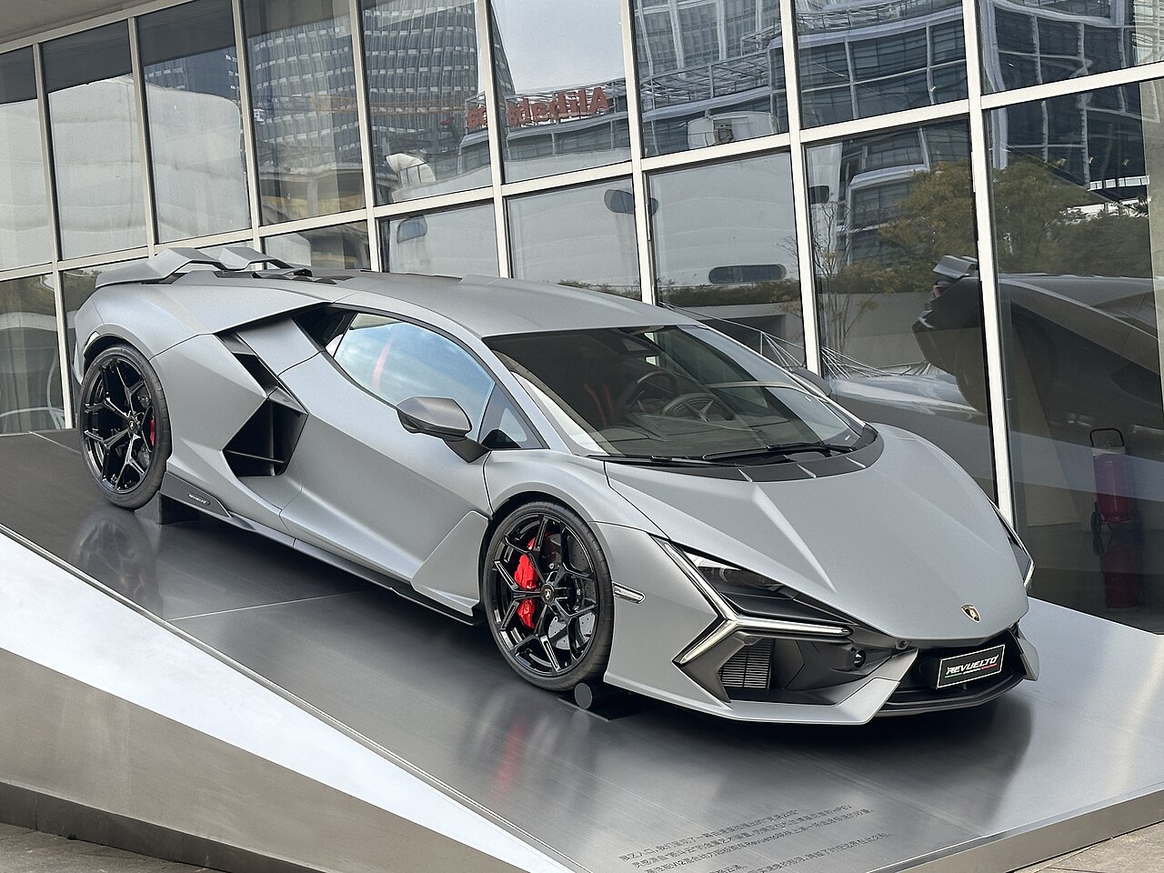 Grey Lamborghini Revuelto front and side
