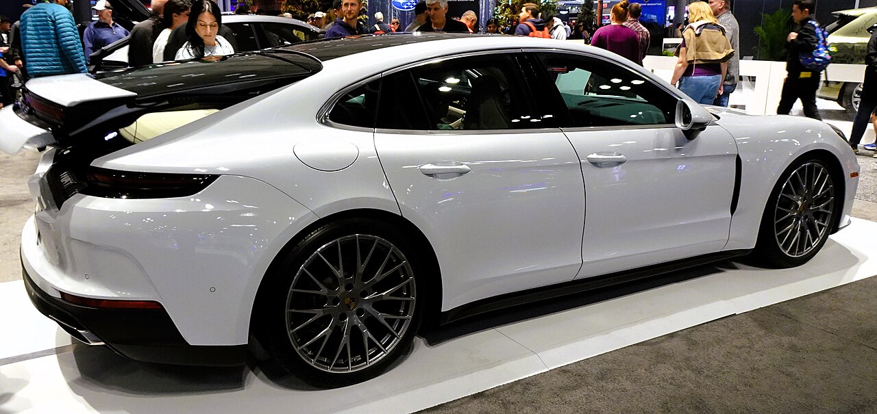 White Porsche Panamera 4 rear and side