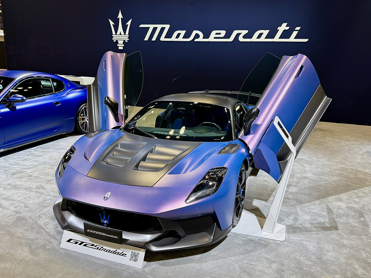 Purple Maserati GT2 Stradale with butterfly doors open
