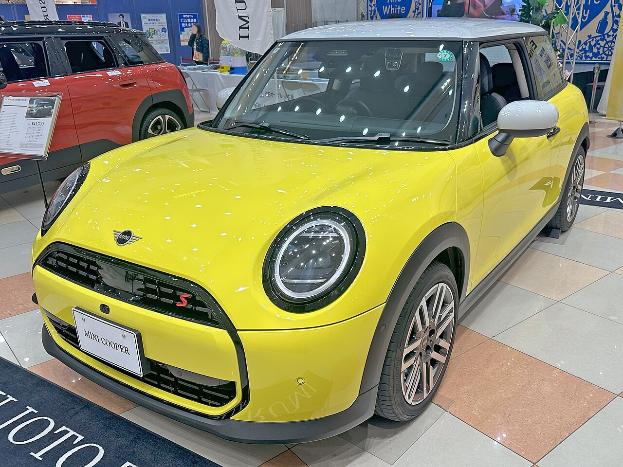 Yellow MINI Cooper S F66 front and side