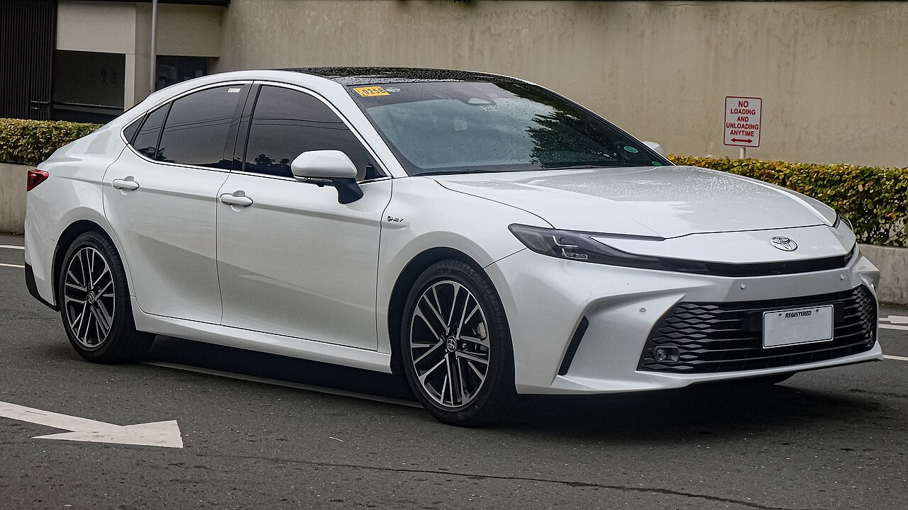 White Toyota Camry XV80 hybrid front and side