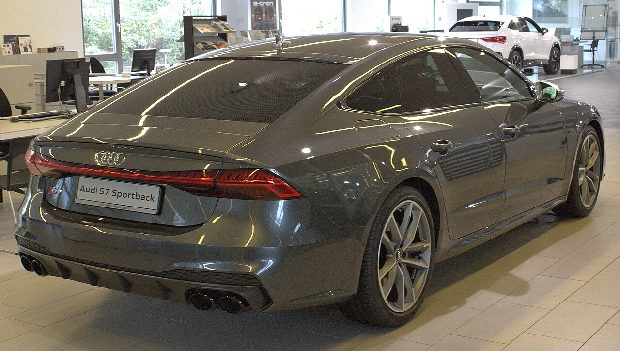 Grey Audi S7 C8 Sportback, rear three-quarter view