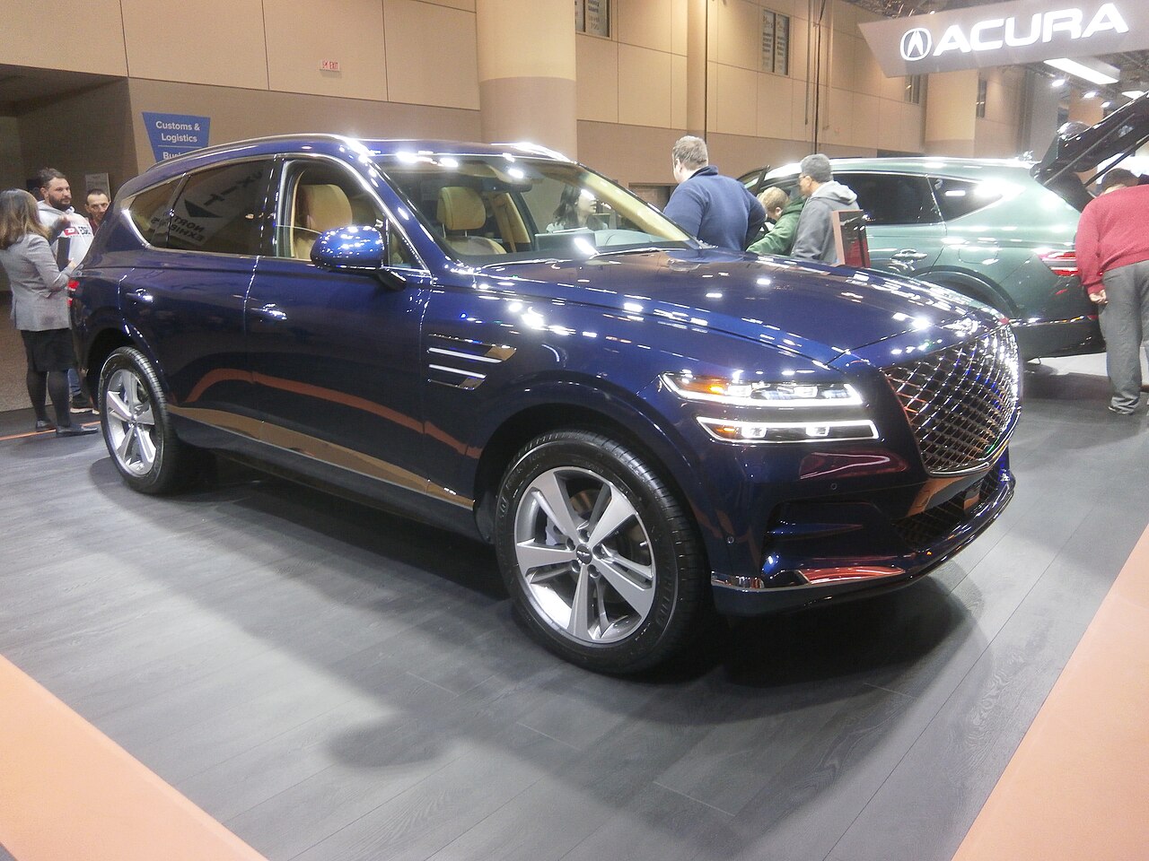 Blue 2021 Genesis GV80, front three-quarter view