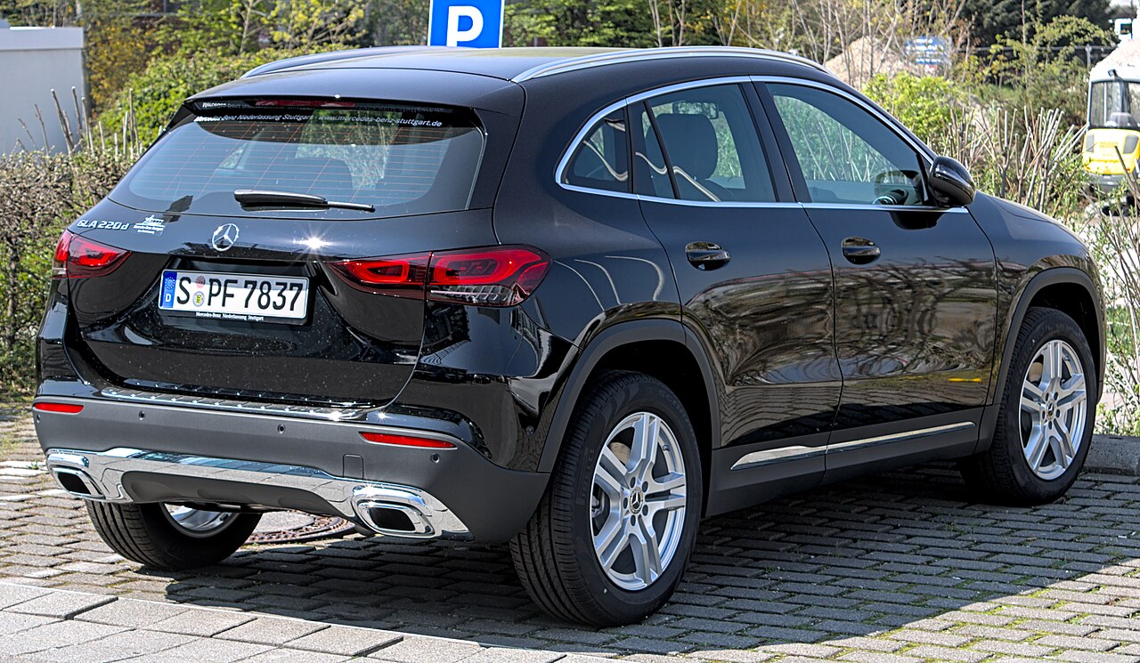 Black Mercedes-Benz GLA H247, rear three-quarter view