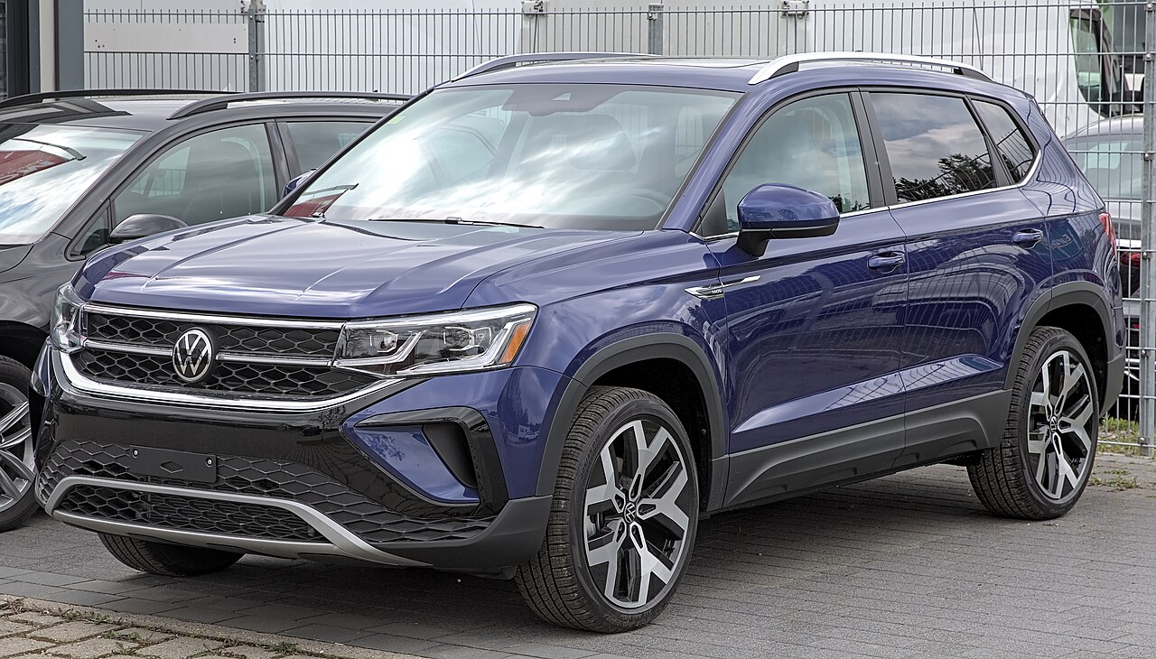 Blue Volkswagen Taos, front three-quarter view