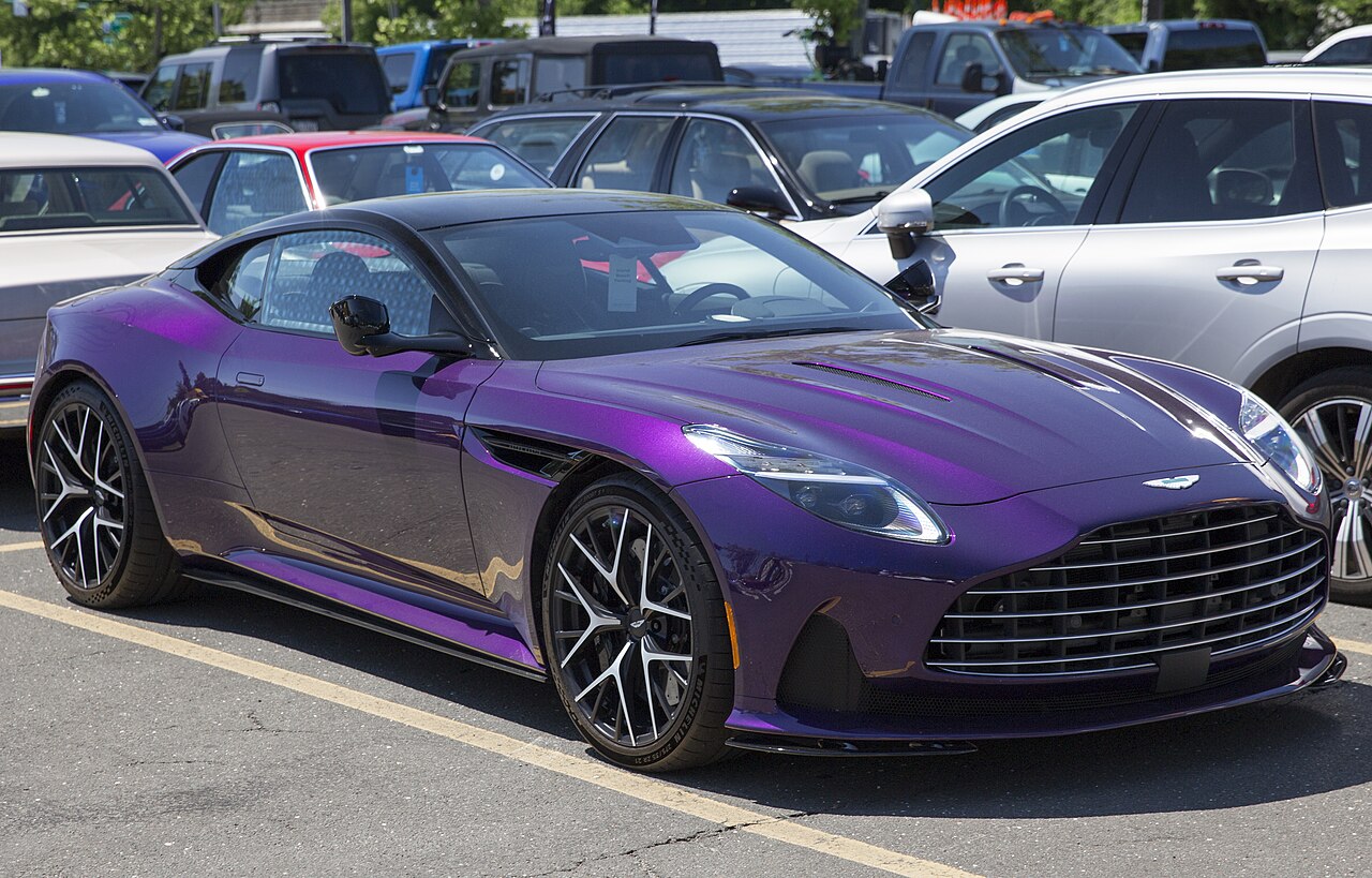 Purple Aston Martin DB12 Coupe, front three-quarter view