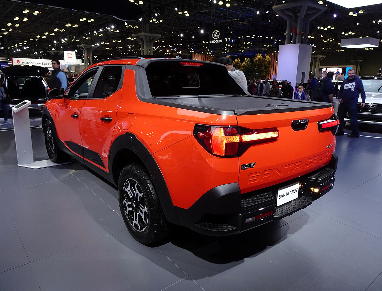 Orange Hyundai Santa Cruz XRT, rear three-quarter view