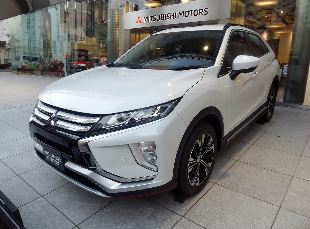 White Mitsubishi Eclipse Cross G Plus Package, front three-quarter view