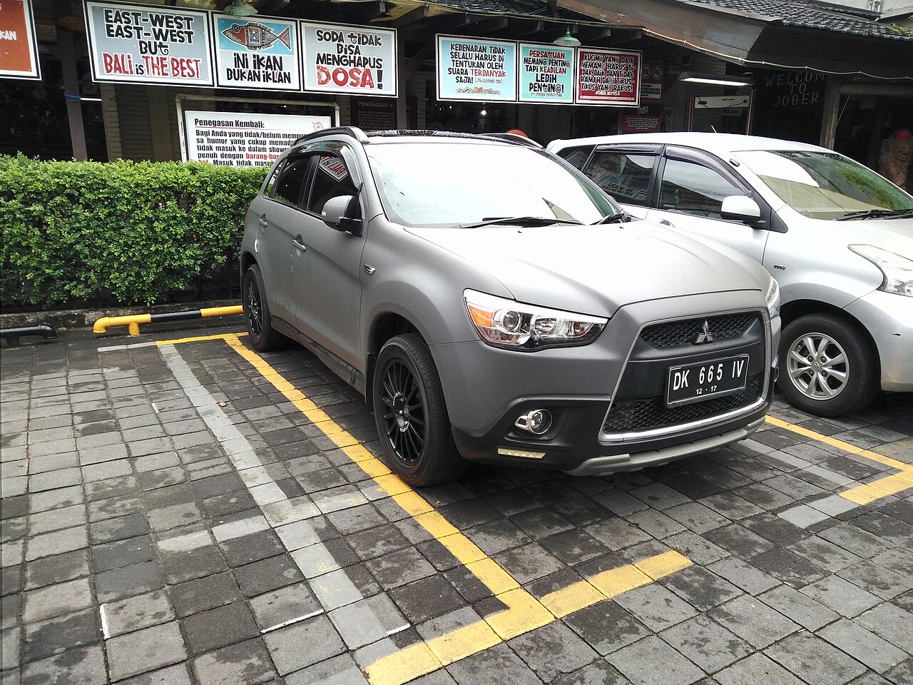 Grey 2012 Mitsubishi Outlander Sport, front three-quarter view