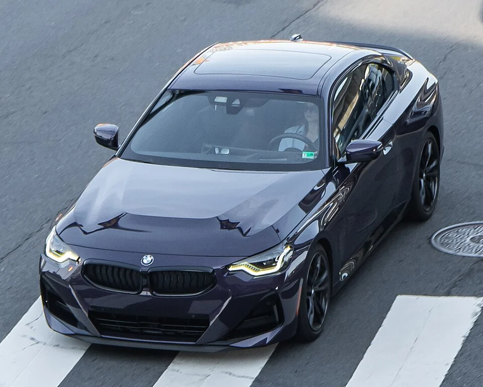 Front exterior — BMW 230i G42 coupe photographed in the United States; exterior reference for the coupe, not the Gran Coupe.
