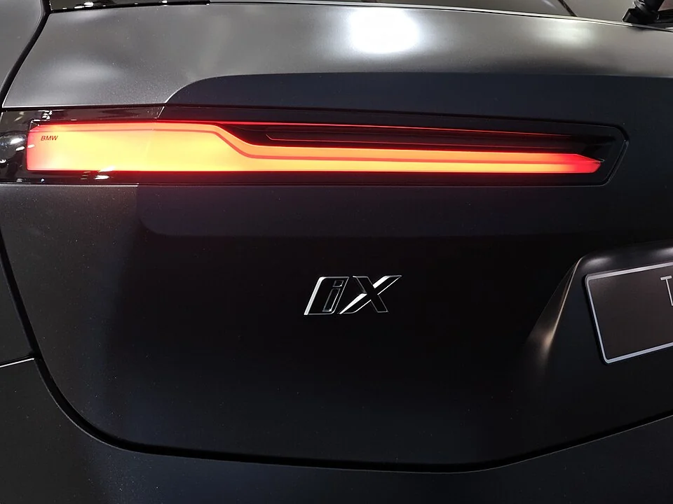 Rear lamp and badge detail — BMW iX M70 at the 2025 Seoul show; exterior and rear lamp/badge detail, with market-specific equipment.