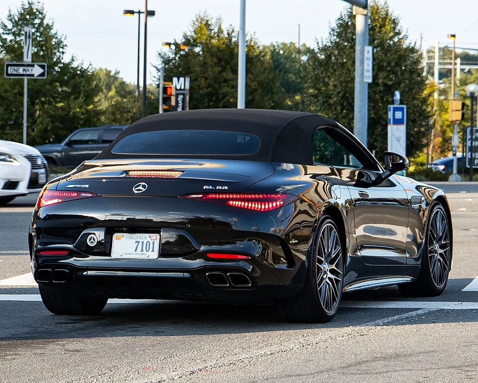 Rear exterior — Mercedes-AMG SL63 R232 photographed in the United States; separate rear and front examples, not the later E Performance plug-in hybrid.