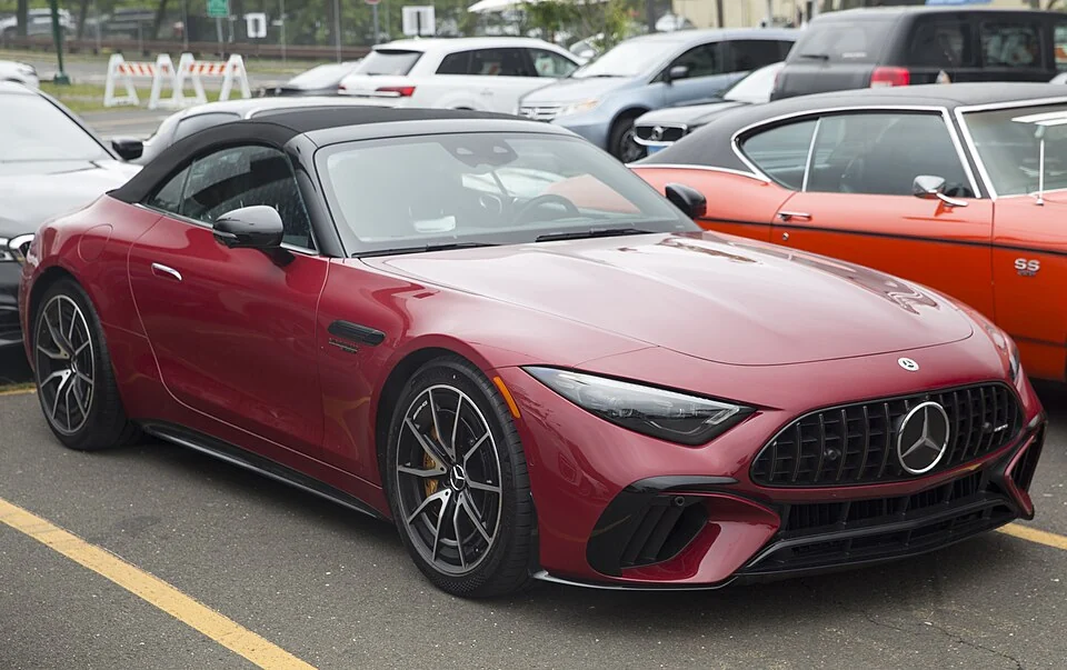 Front exterior — Mercedes-AMG SL63 R232 photographed in the United States; separate rear and front examples, not the later E Performance plug-in hybrid.