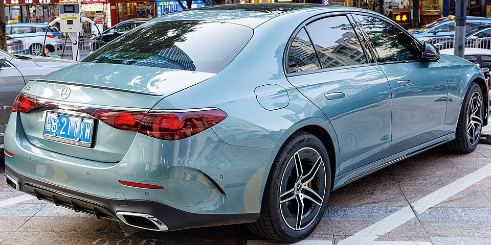 Rear exterior — Mercedes-Benz E-Class W214 photographed in China; overseas body reference, not verification of U.S. MY2024 equipment.