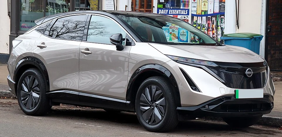 Front exterior — 2023 Nissan Ariya Advance photographed in the UK; body reference only, not a U.S. MY2024 trim specification.
