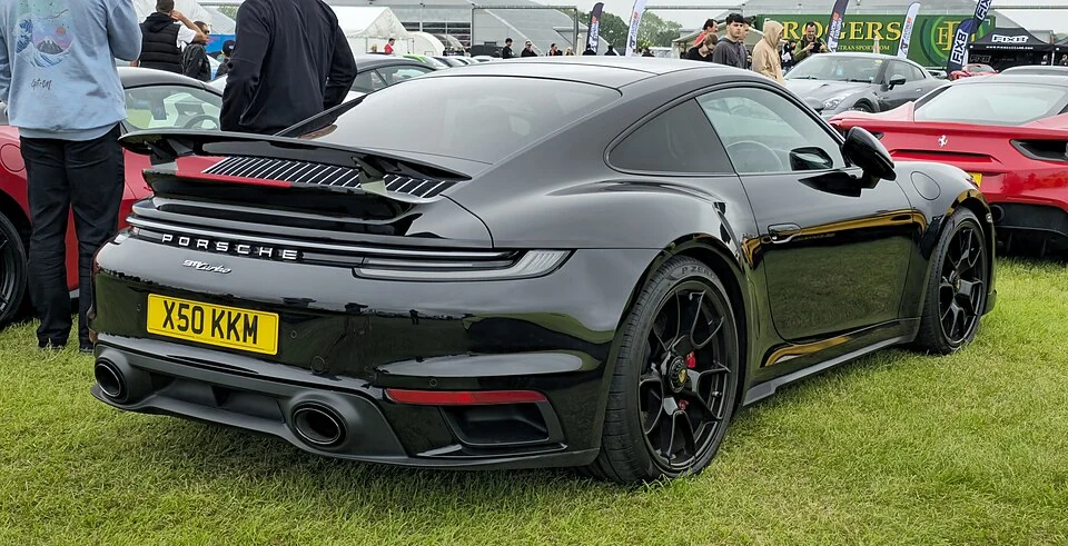 Rear exterior — Porsche 911 Turbo 992.1, not Turbo S, photographed in the UK; later examples illustrate the body, not the exact 2020 launch specification.
