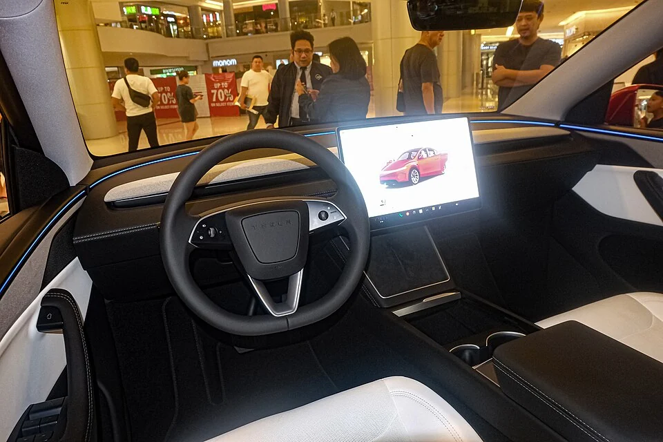 Interior — Refreshed 2025 Tesla Model Y Long Range AWD shown in Thailand; right-hand-drive interior and overseas equipment, not a U.S. configuration guarantee.