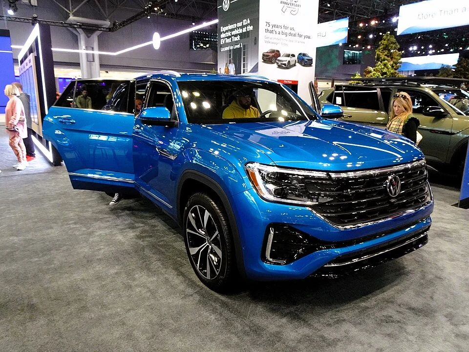 Front exterior — 2024 Atlas Cross Sport SEL R-Line at a U.S. auto show; equipment shown is trim-specific.