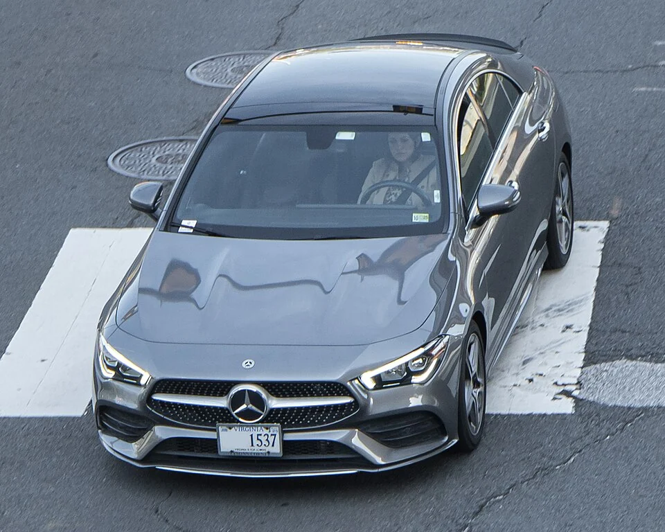 Front exterior — Mercedes-Benz CLA250 C118 shown from two front angles; earlier pre-facelift exterior reference, not a photograph of the MY2024 facelift or its mild-hybrid hardware.